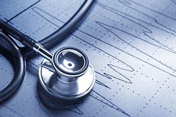 A stethoscope on wood